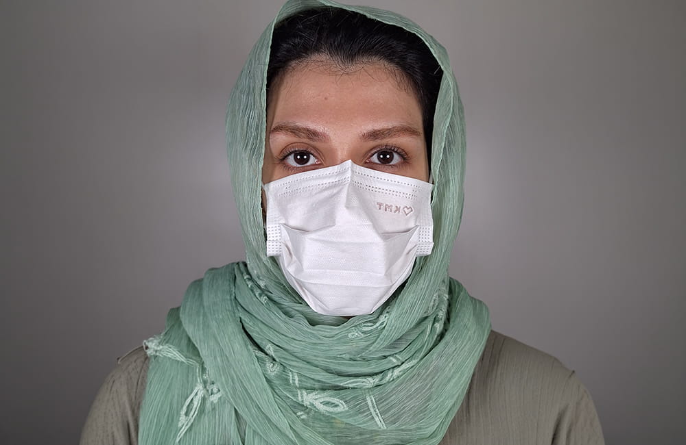 Female patient with natural dark brown eyes before Magical Gray eye color change by keratopigmentation at Chromatic Eyes Medical Center