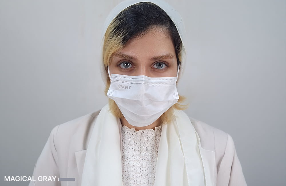 Female patient with Magical Gray corneal pigmentation result after permanent eye color change by keratopigmentation at Chromatic Eyes Medical Center