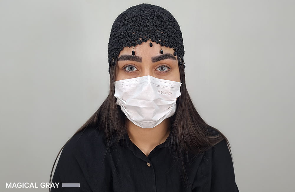 Female patient with Magical Gray corneal pigmentation result after permanent eye color change by keratopigmentation at Chromatic Eyes Medical Center, Vanak Square, Tehran, Iran